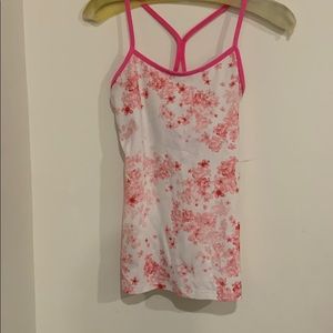 Pink and white Lululemon athletic top